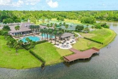 Gorgeous pool home nestled on a quiet street in the highly on Plantation Bay Golf and Country Club in Florida - for sale on GolfHomes.com, golf home, golf lot