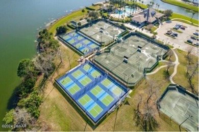 Gorgeous pool home nestled on a quiet street in the highly on Plantation Bay Golf and Country Club in Florida - for sale on GolfHomes.com, golf home, golf lot