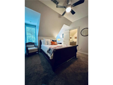 Nestled on a serene, wooded lot with immaculate landscaping and on Moores Mill Golf Club in Alabama - for sale on GolfHomes.com, golf home, golf lot