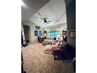Nestled on a serene, wooded lot with immaculate landscaping and on Moores Mill Golf Club in Alabama - for sale on GolfHomes.com, golf home, golf lot