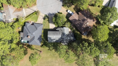 Open and airy Lake Forest golf course home with fortified roof! on Lake Forest Yacht and Country Club in Alabama - for sale on GolfHomes.com, golf home, golf lot