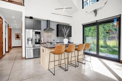 This 4-bedroom, 4-bath, 2,892 sq ft residence is a rare find in on Raven Golf Club At Three Peaks in Colorado - for sale on GolfHomes.com, golf home, golf lot