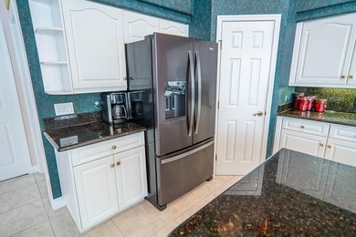 Pride of ownership shines throughout this immaculate well on Plantation Bay Golf and Country Club in Florida - for sale on GolfHomes.com, golf home, golf lot