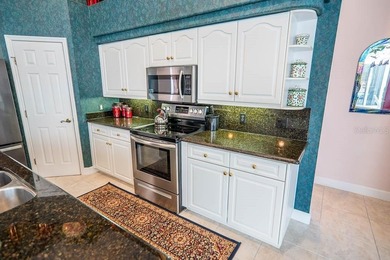 Pride of ownership shines throughout this immaculate well on Plantation Bay Golf and Country Club in Florida - for sale on GolfHomes.com, golf home, golf lot