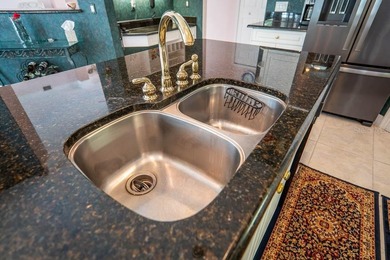 Pride of ownership shines throughout this immaculate well on Plantation Bay Golf and Country Club in Florida - for sale on GolfHomes.com, golf home, golf lot