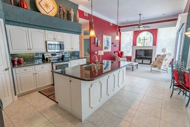 Pride of ownership shines throughout this immaculate well on Plantation Bay Golf and Country Club in Florida - for sale on GolfHomes.com, golf home, golf lot