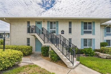 Wonderful second floor 2/2 unit looking out on the water of the on The Glades Golf and Country Club in Florida - for sale on GolfHomes.com, golf home, golf lot