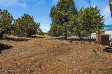 POTENTIAL FOR EXPANSION OR INVESTMENT - Enjoy the space and on Silver Creek Golf Club in Arizona - for sale on GolfHomes.com, golf home, golf lot