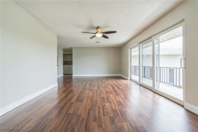 Wonderful second floor 2/2 unit looking out on the water of the on The Glades Golf and Country Club in Florida - for sale on GolfHomes.com, golf home, golf lot