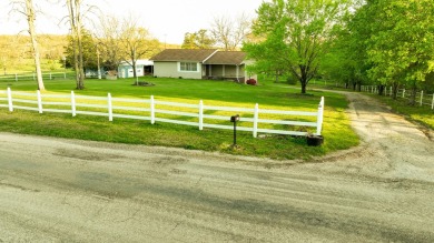 Wake Lane is located just outside of town in Willow Springs on Willow Springs Municipal Golf Course in Missouri - for sale on GolfHomes.com, golf home, golf lot