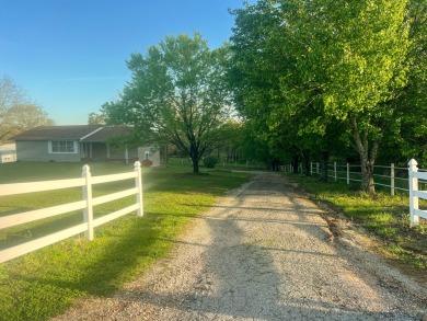 Wake Lane is located just outside of town in Willow Springs on Willow Springs Municipal Golf Course in Missouri - for sale on GolfHomes.com, golf home, golf lot