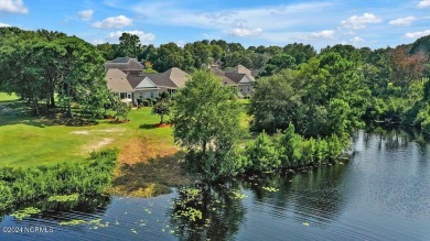 Situated on a picturesque half-acre lot, this beautiful home on Beau Rivage Golf and Resort in North Carolina - for sale on GolfHomes.com, golf home, golf lot