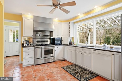 Nestled on 1.32 peaceful acres along scenic Little Greenwood on Prospect Bay Country Club in Maryland - for sale on GolfHomes.com, golf home, golf lot