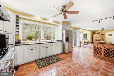 Nestled on 1.32 peaceful acres along scenic Little Greenwood on Prospect Bay Country Club in Maryland - for sale on GolfHomes.com, golf home, golf lot