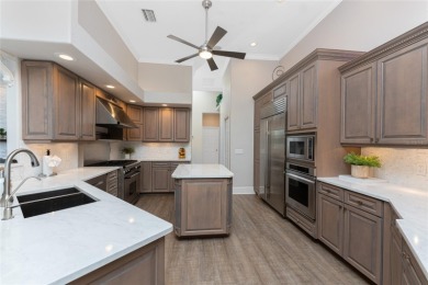 You will absolutely LOVE this spectacular canal front 4-5 BR on Saint Andrews South Golf Club in Florida - for sale on GolfHomes.com, golf home, golf lot