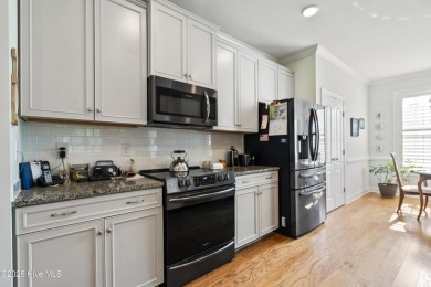 Welcome to this stunning end unit townhome in the Magnolia on Magnolia Greens Golf Plantation in North Carolina - for sale on GolfHomes.com, golf home, golf lot
