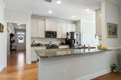 Welcome to this stunning end unit townhome in the Magnolia on Magnolia Greens Golf Plantation in North Carolina - for sale on GolfHomes.com, golf home, golf lot