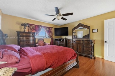 Discover One Of The Premier Locations In Woodmont, Nestled on Woodmont Country Club in Florida - for sale on GolfHomes.com, golf home, golf lot