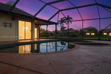 Discover One Of The Premier Locations In Woodmont, Nestled on Woodmont Country Club in Florida - for sale on GolfHomes.com, golf home, golf lot