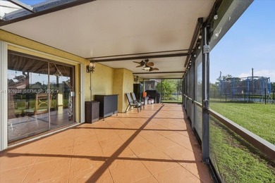 Discover One Of The Premier Locations In Woodmont, Nestled on Woodmont Country Club in Florida - for sale on GolfHomes.com, golf home, golf lot