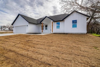 Welcome to your dream home in Runaway Bay, Texas! This stunning on The Club At Runaway Bay in Texas - for sale on GolfHomes.com, golf home, golf lot