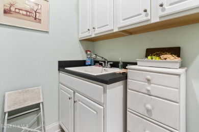 Welcome to this stunning end unit townhome in the Magnolia on Magnolia Greens Golf Plantation in North Carolina - for sale on GolfHomes.com, golf home, golf lot