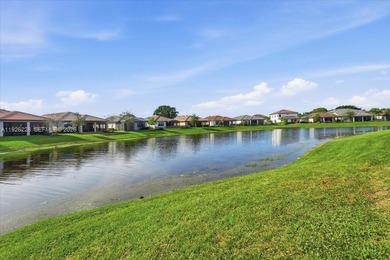 Discover One Of The Premier Locations In Woodmont, Nestled on Woodmont Country Club in Florida - for sale on GolfHomes.com, golf home, golf lot