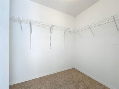 Spacious new home in the highly sought-after Summerfield Village on Summerfield Crossing Golf Club in Florida - for sale on GolfHomes.com, golf home, golf lot