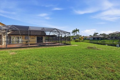 Discover One Of The Premier Locations In Woodmont, Nestled on Woodmont Country Club in Florida - for sale on GolfHomes.com, golf home, golf lot