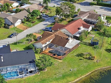 Discover One Of The Premier Locations In Woodmont, Nestled on Woodmont Country Club in Florida - for sale on GolfHomes.com, golf home, golf lot