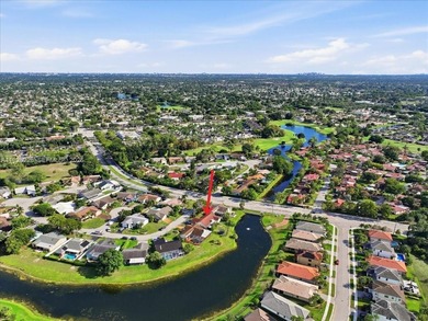 Discover One Of The Premier Locations In Woodmont, Nestled on Woodmont Country Club in Florida - for sale on GolfHomes.com, golf home, golf lot