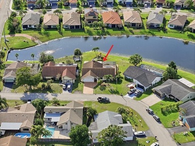 Discover One Of The Premier Locations In Woodmont, Nestled on Woodmont Country Club in Florida - for sale on GolfHomes.com, golf home, golf lot