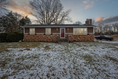 Spacious 3 bedroom ranch home on 1 acre overlooking hole 10 at on Timber Trace Golf Club in Michigan - for sale on GolfHomes.com, golf home, golf lot