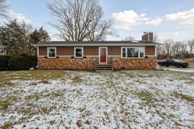 Spacious 3 bedroom ranch home on 1 acre overlooking hole 10 at on Timber Trace Golf Club in Michigan - for sale on GolfHomes.com, golf home, golf lot