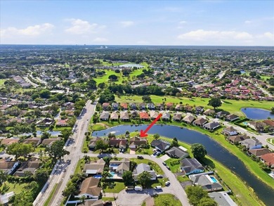 Discover One Of The Premier Locations In Woodmont, Nestled on Woodmont Country Club in Florida - for sale on GolfHomes.com, golf home, golf lot
