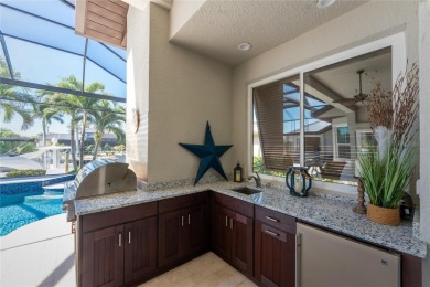 You will absolutely LOVE this spectacular canal front 4-5 BR on Saint Andrews South Golf Club in Florida - for sale on GolfHomes.com, golf home, golf lot