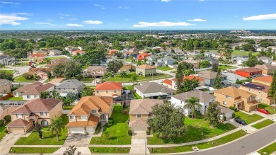 Spacious new home in the highly sought-after Summerfield Village on Summerfield Crossing Golf Club in Florida - for sale on GolfHomes.com, golf home, golf lot