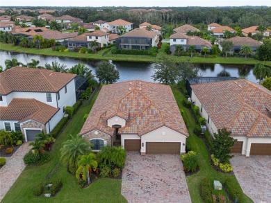 Discover luxury living in the picturesque, gated community of on Esplanade Golf and Country at Lakewood Ranch in Florida - for sale on GolfHomes.com, golf home, golf lot