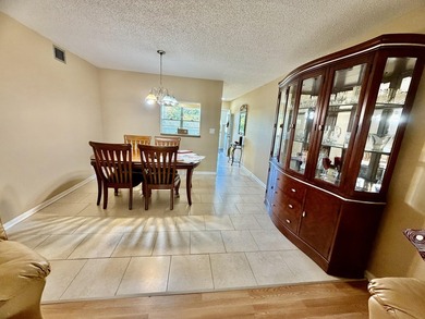REDUCED FOR QUICK SALE!! Top-Floor Serenity Meets Resort-Style on Wynmoor Golf Course in Florida - for sale on GolfHomes.com, golf home, golf lot