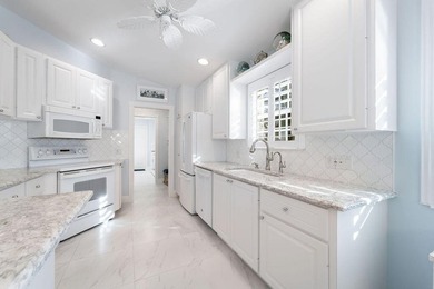 Exceptional 2-bedroom, 2-bath Capri villa located in the highly on Lost Lake Golf Club in Florida - for sale on GolfHomes.com, golf home, golf lot