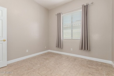 Gated community living at its best! This 4-bedroom, 2-bath home on Palm Valley Golf Club  in Arizona - for sale on GolfHomes.com, golf home, golf lot