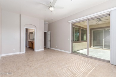 Gated community living at its best! This 4-bedroom, 2-bath home on Palm Valley Golf Club  in Arizona - for sale on GolfHomes.com, golf home, golf lot