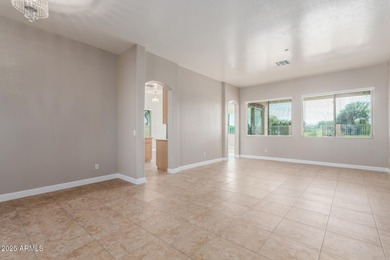 Gated community living at its best! This 4-bedroom, 2-bath home on Palm Valley Golf Club  in Arizona - for sale on GolfHomes.com, golf home, golf lot