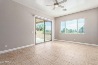 Gated community living at its best! This 4-bedroom, 2-bath home on Palm Valley Golf Club  in Arizona - for sale on GolfHomes.com, golf home, golf lot