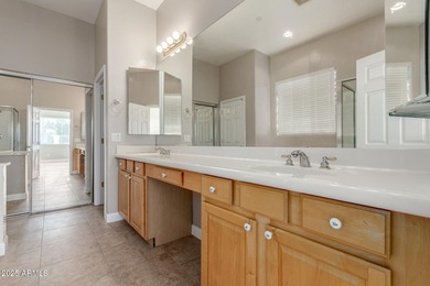 Gated community living at its best! This 4-bedroom, 2-bath home on Palm Valley Golf Club  in Arizona - for sale on GolfHomes.com, golf home, golf lot