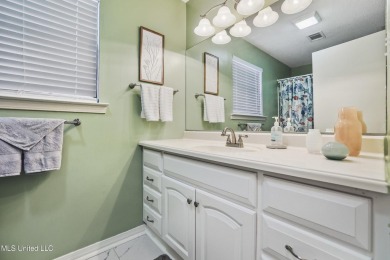 Move-in ready home in the highly sought-after Diamondhead golf on Diamondhead Country Club in Mississippi - for sale on GolfHomes.com, golf home, golf lot