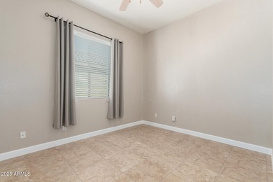 Gated community living at its best! This 4-bedroom, 2-bath home on Palm Valley Golf Club  in Arizona - for sale on GolfHomes.com, golf home, golf lot