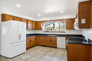 Welcome home to this spacious 4-bedroom home boasting an on Desert Greens Golf Course in New Mexico - for sale on GolfHomes.com, golf home, golf lot