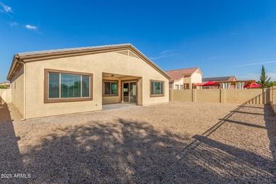 Gated community living at its best! This 4-bedroom, 2-bath home on Palm Valley Golf Club  in Arizona - for sale on GolfHomes.com, golf home, golf lot