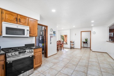 Welcome home to this spacious 4-bedroom home boasting an on Desert Greens Golf Course in New Mexico - for sale on GolfHomes.com, golf home, golf lot